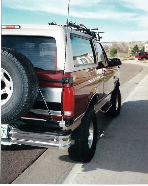 1996 Ford Bronco - 4' firefly antenna mounted on the rear tire rack.
