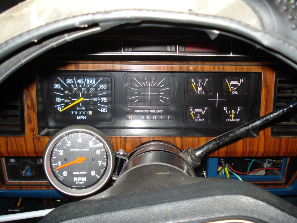 1984 Ford Bronco dashboard with aftermarket tachometer