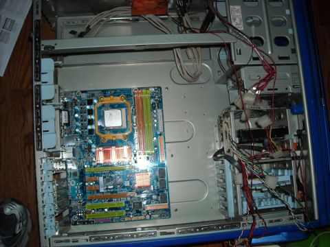 1979 Ford F-150 - A computer motherboard, a CPU and RAM modules, is installed within a server chassis, surrounded by various cables and components.