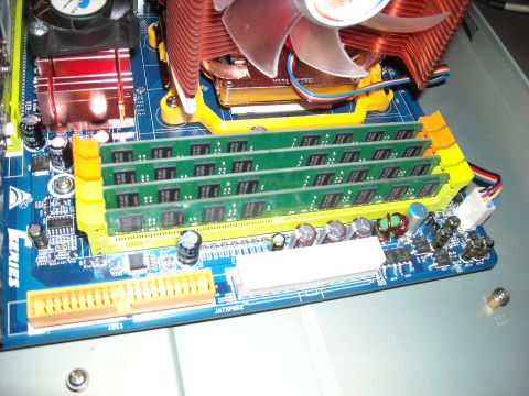 1979 Ford F-150 - Close-up of a computer motherboard installed RAM modules and a CPU heatsink.