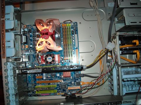 1979 Ford F-150 - Internal components of a computer, including a motherboard, CPU cooler, and wiring, are visible.