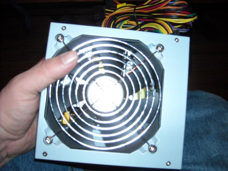 Computer power supply unit with fan and colorful wires
