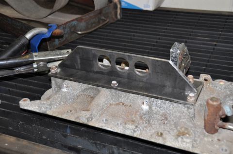 1996 Ford Bronco - Custom bracket attached to an intake manifold, likely for engine hoist use.