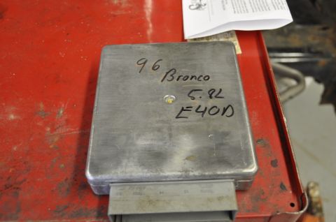 1996 Ford Bronco - Engine control unit marked with '96 Bronco 5.8L E4OD', indicating it is from a 1996 Ford Bronco.
