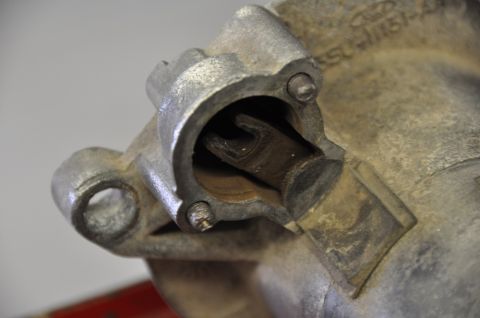 1996 Ford Bronco - Detail of a starter solenoid, showing internal components and casting marks, possibly from a Ford vehicle.