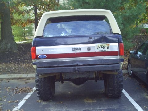 1990 Ford Bronco - Rear view of a 1990 Ford Bronco showing its license plate and taillights.