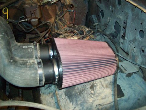 1985 Ford Bronco - Aftermarket air filter assembly installed in the engine bay.