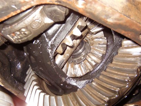 1983 Ford Bronco - I think if I had tried, it would have been easy to remove this C-clip through the fill hole in the front of the axle beam. I might omit it…