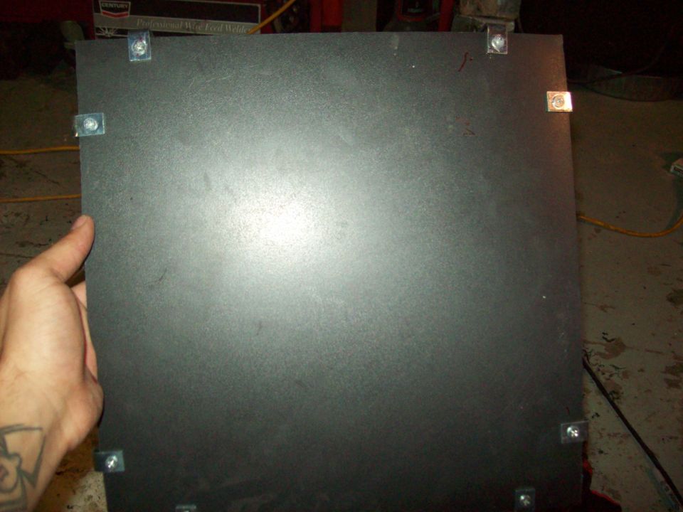 Black panel with bolts