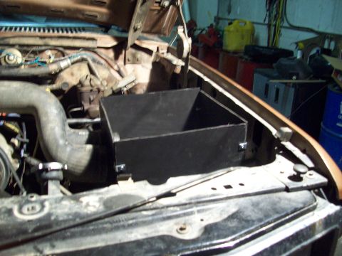 1985 Ford Bronco - Custom metal box installed in the engine bay of a vehicle.