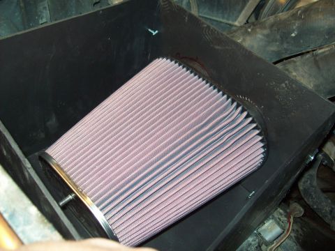 1985 Ford Bronco - A new engine air filter is installed in its black housing.