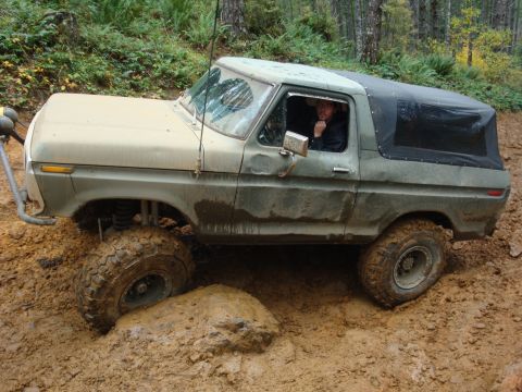 1978 Ford Bronco - This 1978 Ford Bronco navigates a challenging muddy terrain during an off-road excursion.