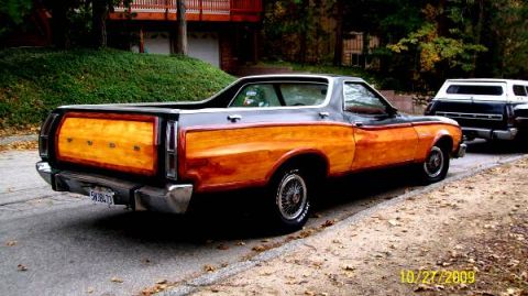 1973 Ford Ranchero - Rear view of a 1973 Ford Ranchero wood paneling on the bed and sides.