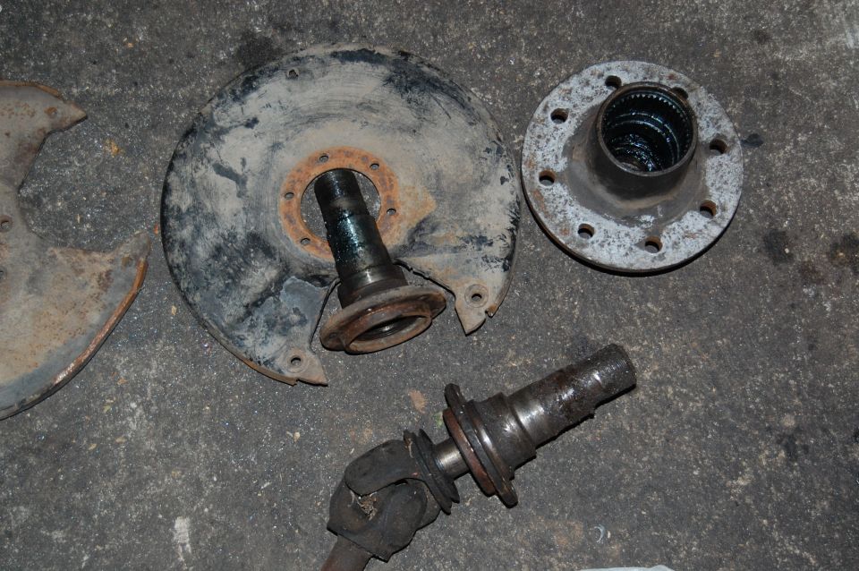 Axle spindle, hub, and backing plate on concrete