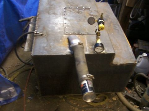 1995 Ford C-350 (Centurion Conversions) - A custom-built metal tank with attached gauges and a hose, possibly for fuel or air.