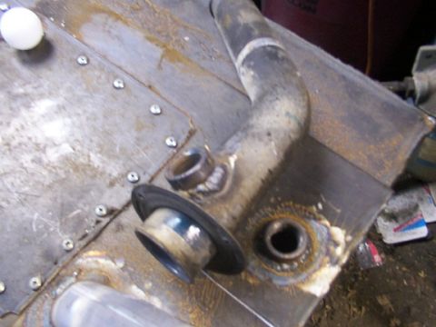 1995 Ford C-350 (Centurion Conversions) - A custom fuel tank with welded fittings and a rubber gasket is shown in detail.