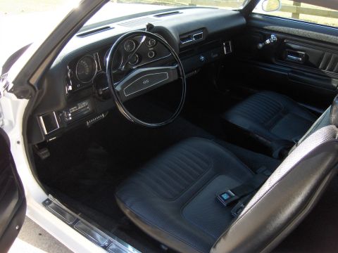 1970 Chevrolet Camaro - Interior view of a 1970 Chevrolet Camaro, showing the dashboard, steering wheel, and front seats.
