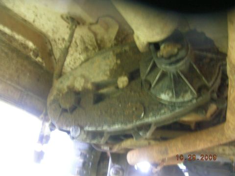 1991 Ford F-150 - The underside of a dirty transfer case is visible, with a date stamp of 10.29.2009.