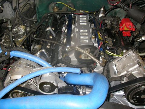1990 Ford Bronco - Fuel line modification due to interference with ECT Sensor.