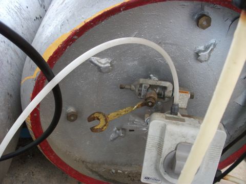 1992 Ford F-150 - This image shows the fittings and valves on an air tank, not a 1992 Ford F-150.