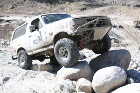 1995 Ford Bronco - Modified 1995 Ford Bronco navigating a rocky off-road course.