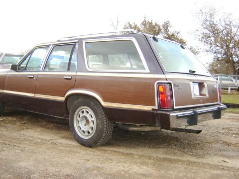 1984 Ford LTD - Rear view of a 1984 Ford LTD station wagon with wood paneling.