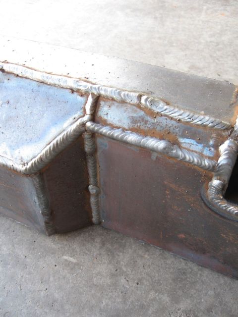 1995 Ford F-150 - Custom welded steel part shown up close, likely for a vehicle modification.