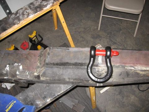 1995 Ford F-150 - A bumper with a shackle attached is shown, resting on sawhorses.