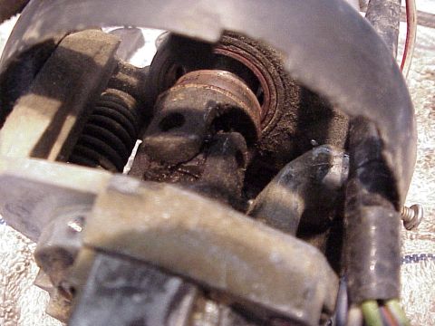 1979 Ford Bronco - Detail of a damaged steering column part, likely requiring repair or replacement.