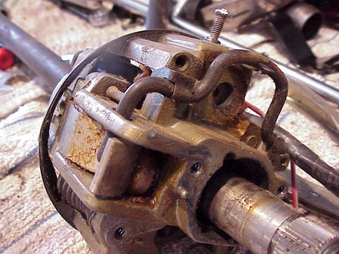 1979 Ford Bronco - Close-up of a corroded steering column part, indicating wear and tear.