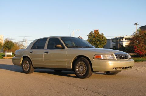 2004 Ford Crown Victoria - This 2004 Ford Crown Victoria is seen from the front three-quarter view on a paved surface.