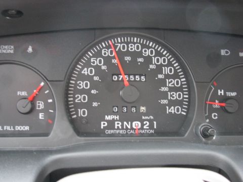 2004 Ford Crown Victoria - The dashboard shows a speedometer reading 60 mph and an odometer reading 75,555 miles.