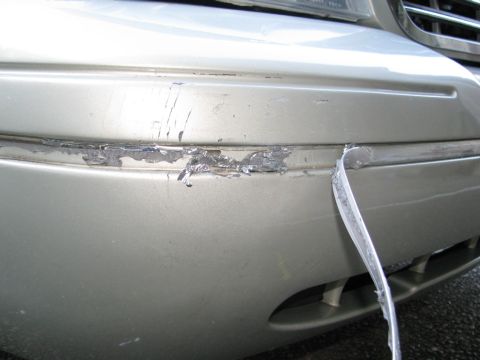 2004 Ford Crown Victoria - Removal. Note the adhesive residue.