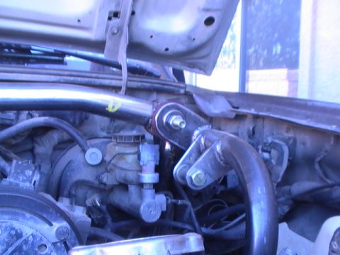 1997 Ford Ranger - Custom metal bracing is installed in the engine bay of a vehicle.