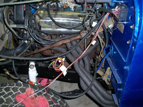 1978 Jeep CJ5 - Close-up view of an engine bay, showing various mechanical components and wiring.