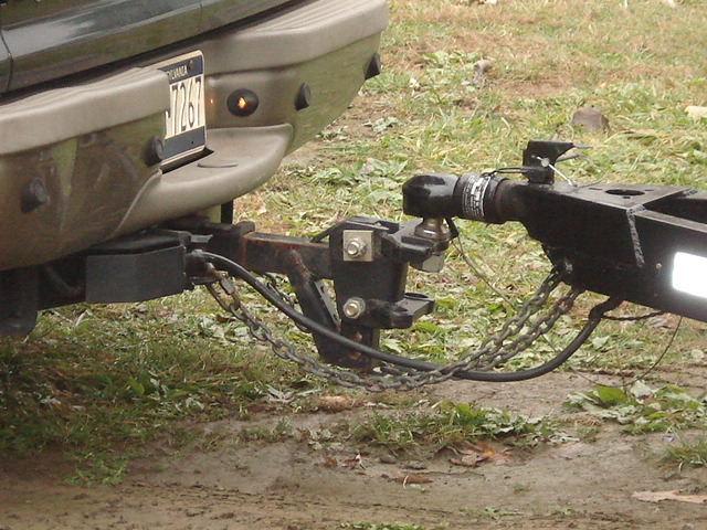 2000 Ford Excursion rear bumper with trailer hitch and chains