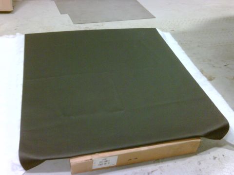 1979 Ford F-250 - A dark green headliner is shown, with a label attached to its wooden support. The registry claims it is from a 1979 Ford F-250.