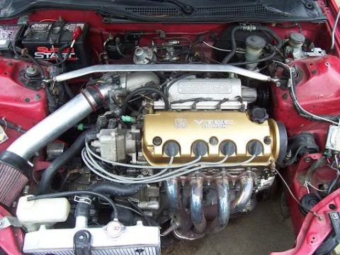 1989 Ford Bronco - Engine bay of a Honda vehicle, a VTEC engine and aftermarket modifications.
