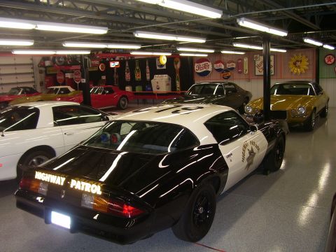 1979 Chevrolet Camaro - Rear view of a 1979 Chevrolet Camaro police car, "HIGHWAY PATROL" text visible on the trunk lid.