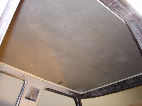 1979 Ford F-250 - Interior view of a vehicle's ceiling, showing unfinished headliner material with printed text.