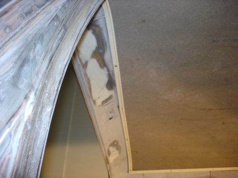 1979 Ford F-250 - Close-up view of interior paneling, showing primer and a seam, possibly during restoration.