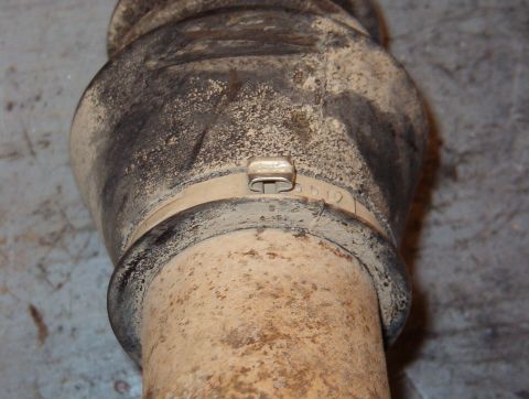 1983 Ford Bronco - I straightened & then reset the keystone clamps on the slip yoke boot.