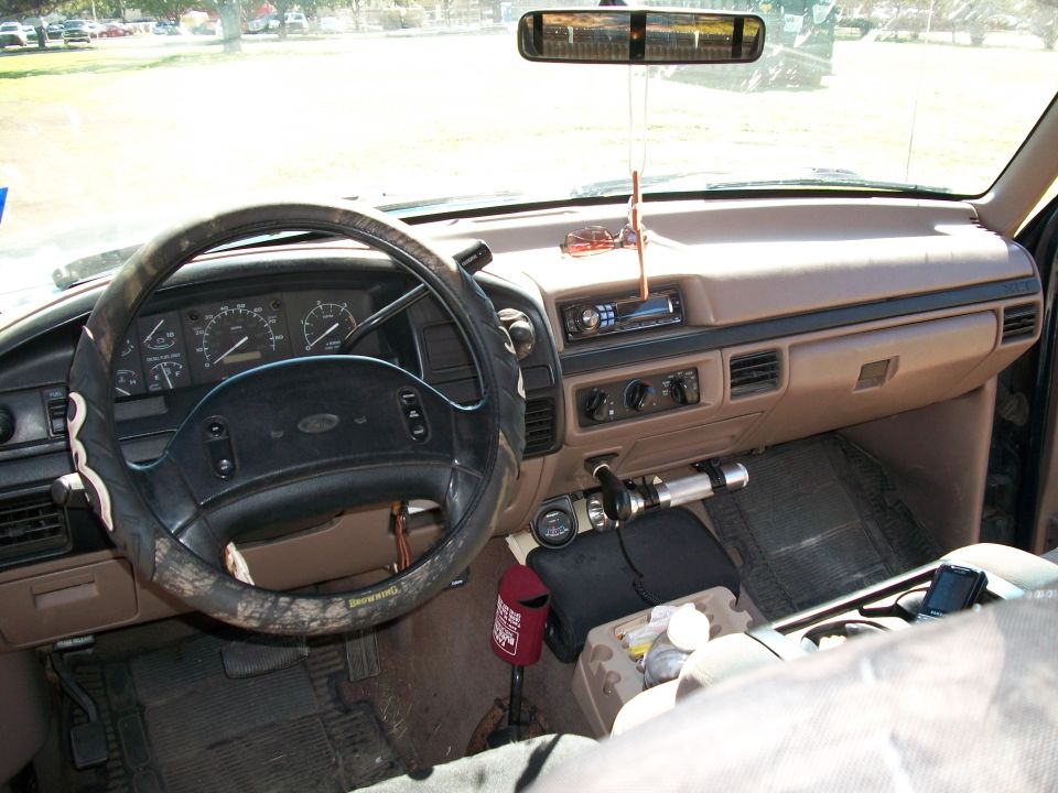 1996 Ford F-250 interior showing dashboard, steering wheel, and center console