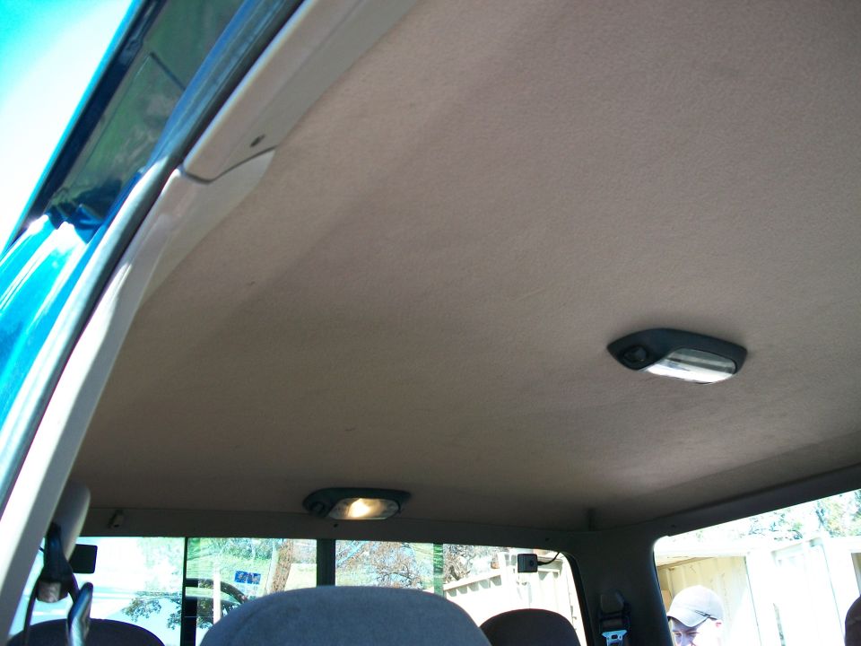 Interior ceiling of a 1996 Ford F-250 with two dome lights
