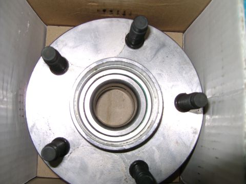 1998 Ford Crown Victoria - A close-up view of a front wheel hub, a critical component for vehicle wheel attachment.