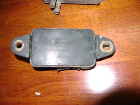 1998 Ford Crown Victoria - A Ford DPFE sensor is shown, identified by the Ford logo and part number F27E-9J460-BC.