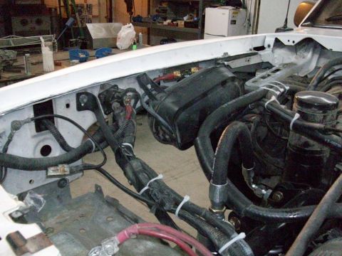 1996 Ford Bronco - The wiring and hoses in the engine bay are visible, with a watermark for SuperMotors.net at the bottom right.