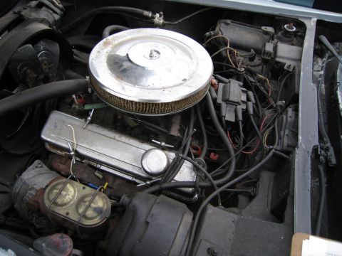 1991 Ford LTD Crown Victoria - Close-up view of a car's engine bay, showing various components and wiring.