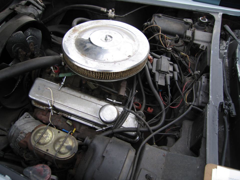 Engine bay with chrome air cleaner, valve covers, and brake fluid reservoir