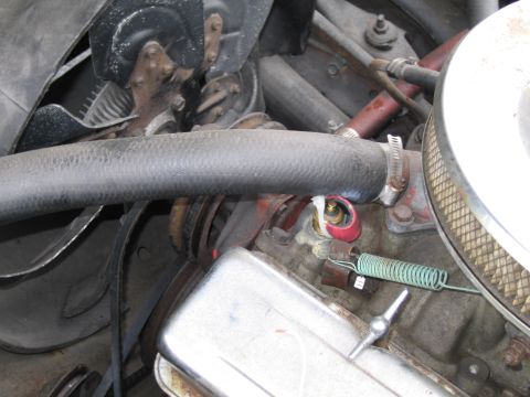1991 Ford LTD Crown Victoria - Close-up view of an engine bay, showing various mechanical parts and hoses.